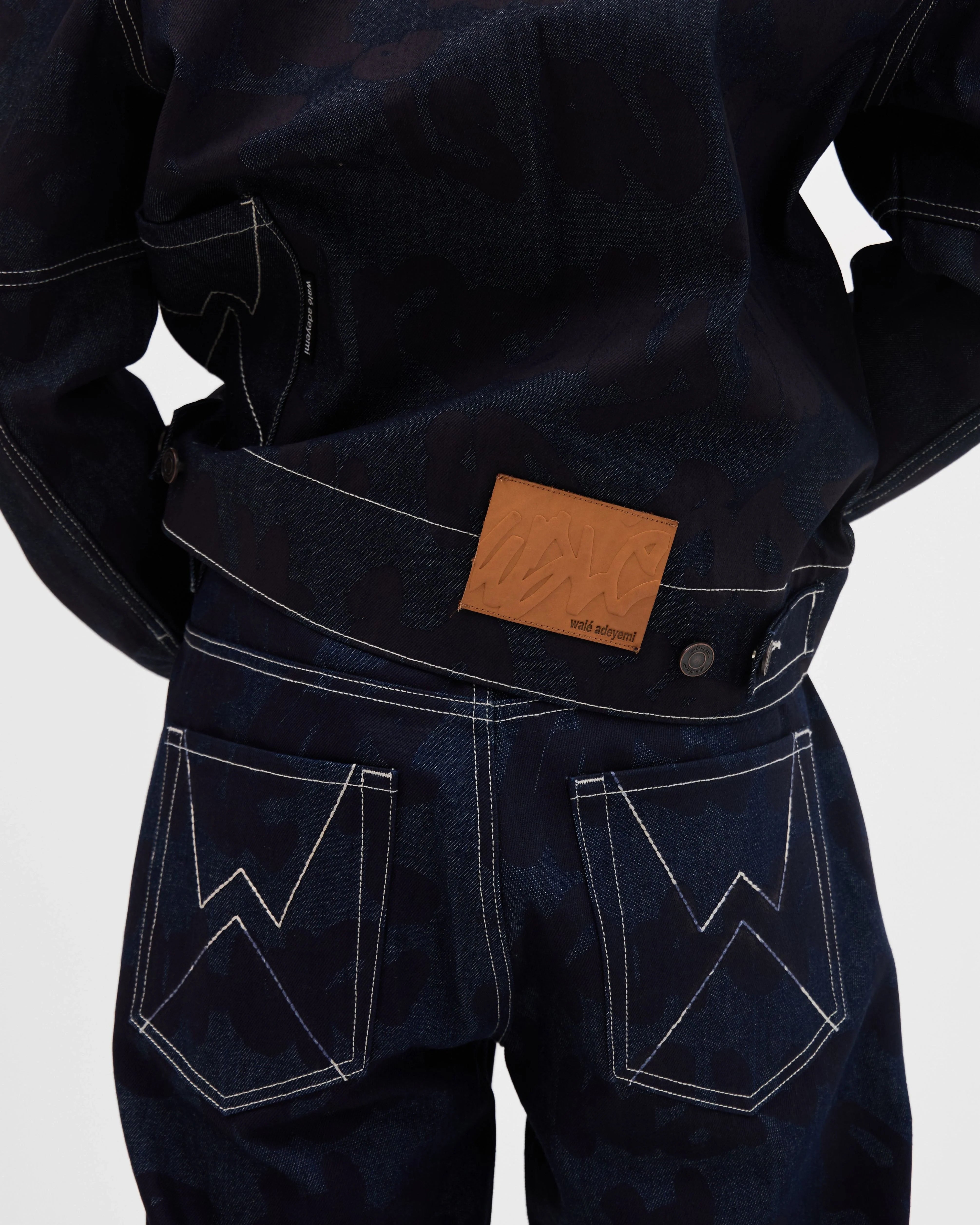 Model wearing the Walé Adeyemi Sound Clash Denim Jacket in Navy/Blue, alternate view