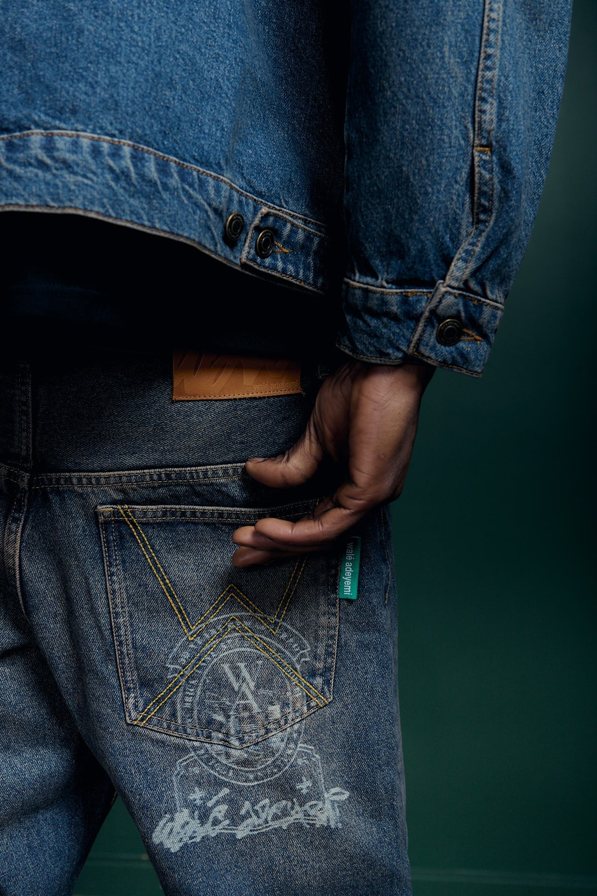 Autumn / Winter 2026: denim jacket and jeans, back pocket detail
