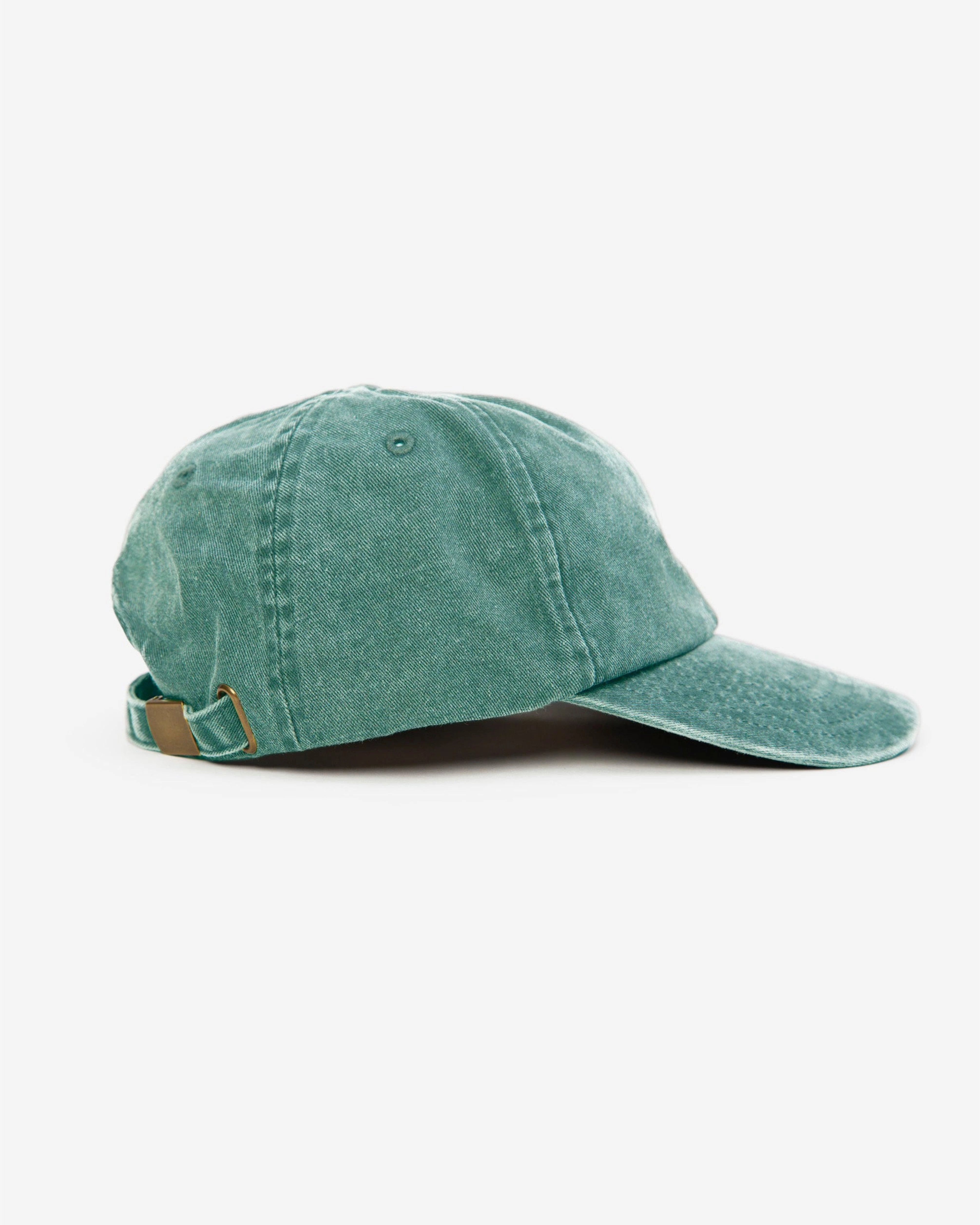 Model wearing the Walé Adeyemi Chorus Cap in Green/Red