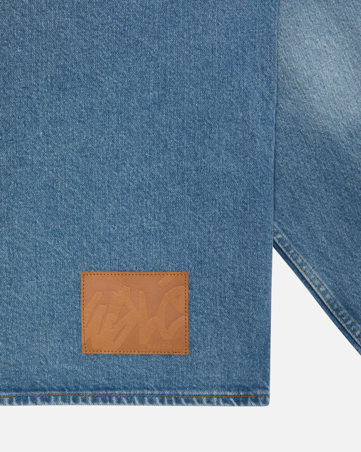 Walé Adeyemi Studio Denim Overshirt in Blue (light blue wash), hem patch detail