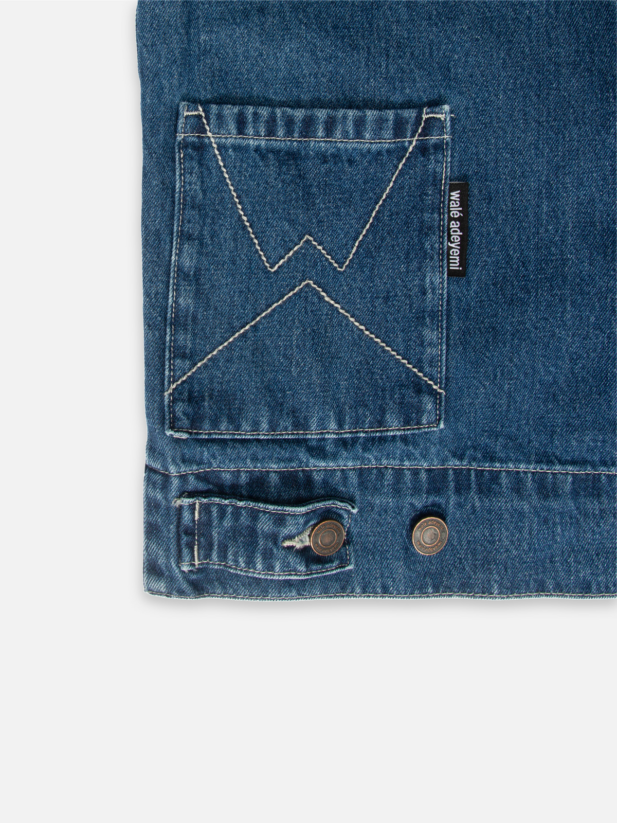 Close-up of the front pocket on Walé Adeyemi Phantom Denim Jacket in Ink