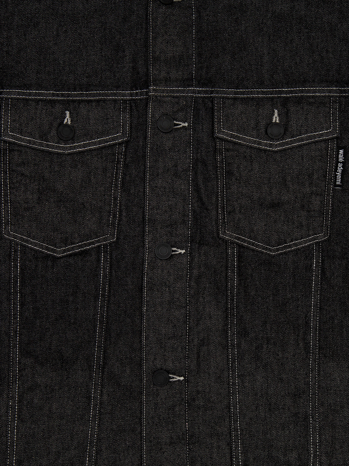 Close-up of the front of the Walé Adeyemi Midnight Graf Denim Jacket in Black