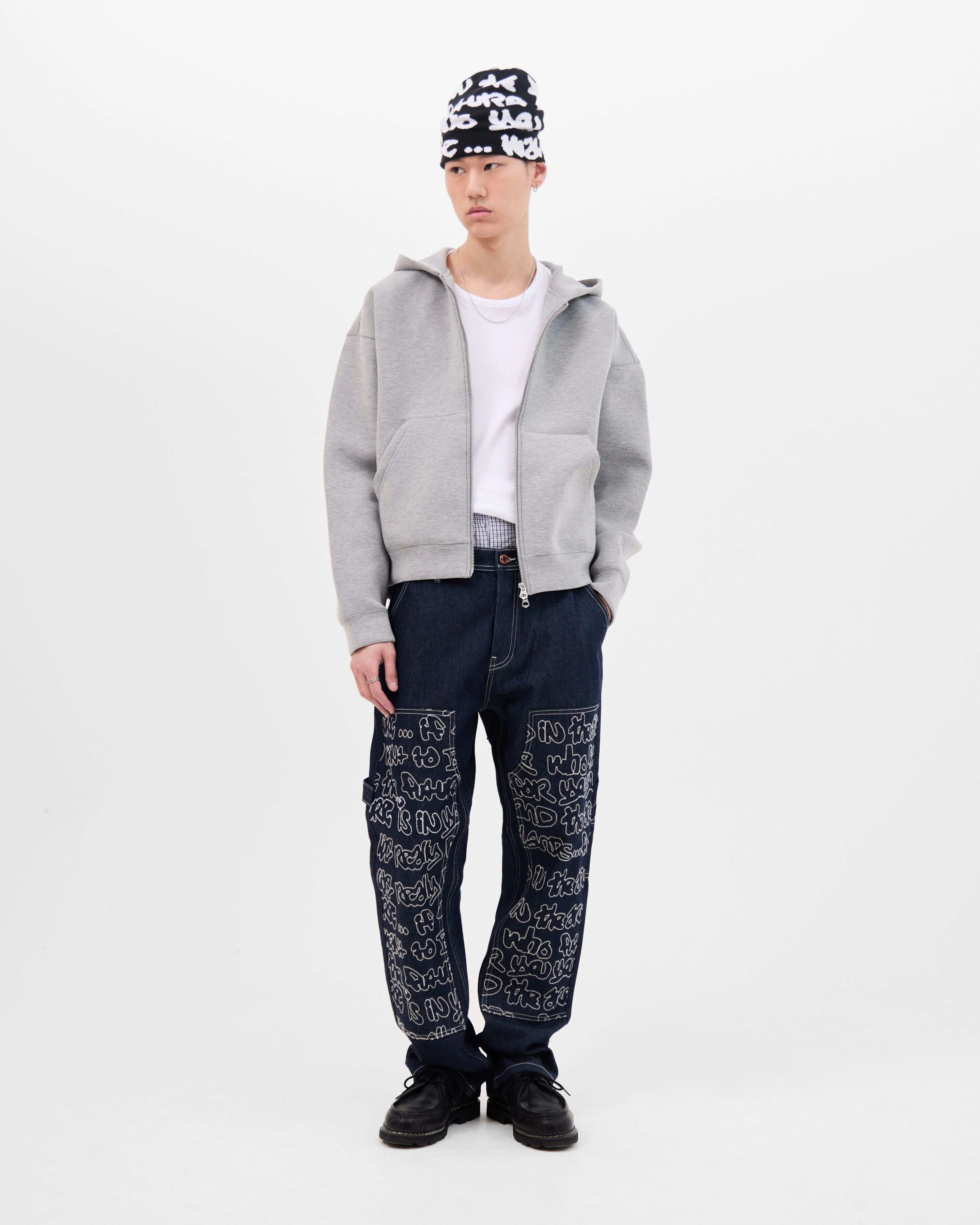 Model wearing the Walé Adeyemi Archive Carpenter Jeans in Navy