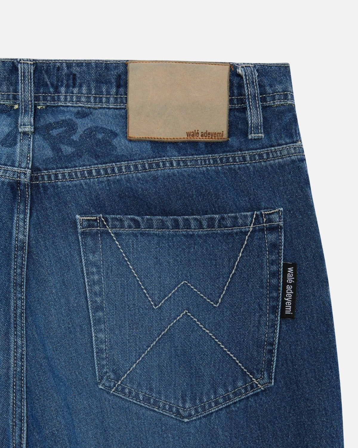 Close-up of the back pocket on Walé Adeyemi Phantom Denim Jeans in Ink