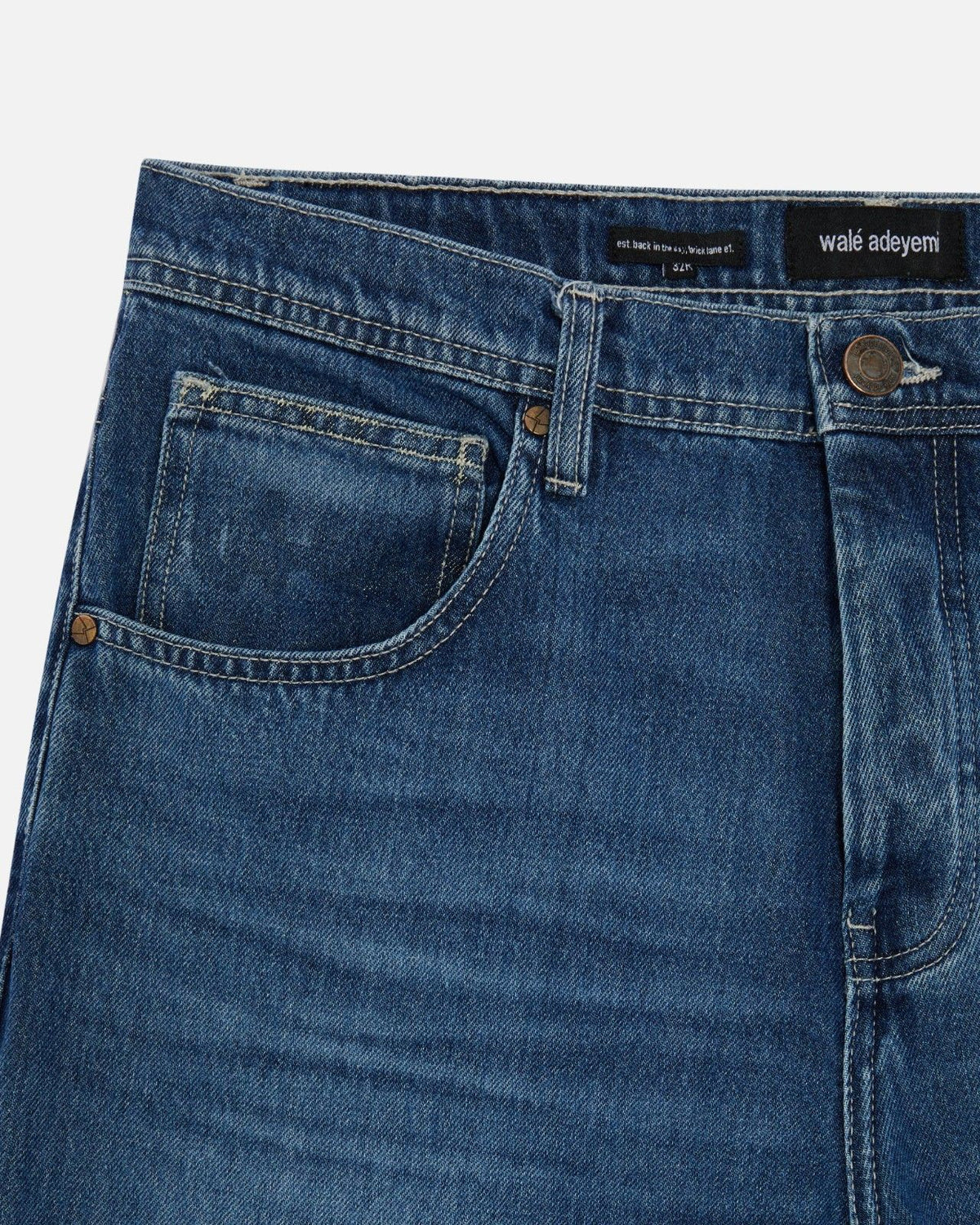 Close-up of the front pocket on Walé Adeyemi Phantom Denim Jeans in Ink