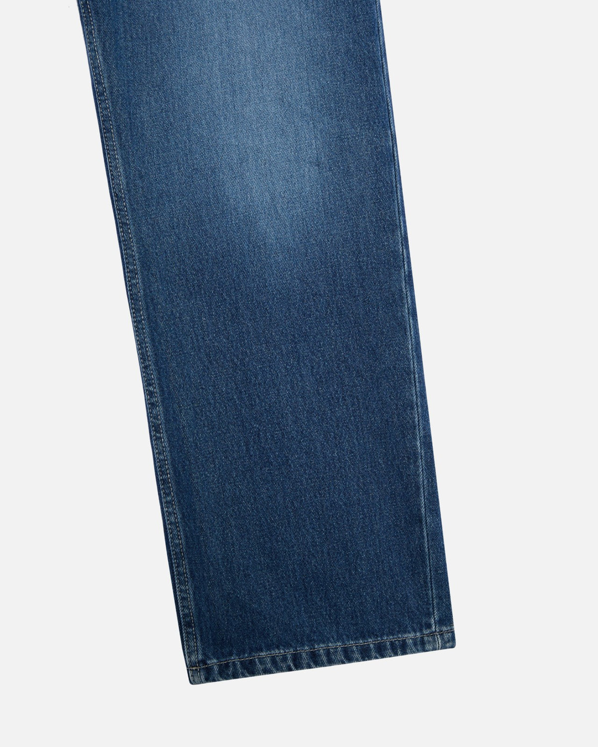 Close-up of the hem on Walé Adeyemi Phantom Denim Jeans in Ink