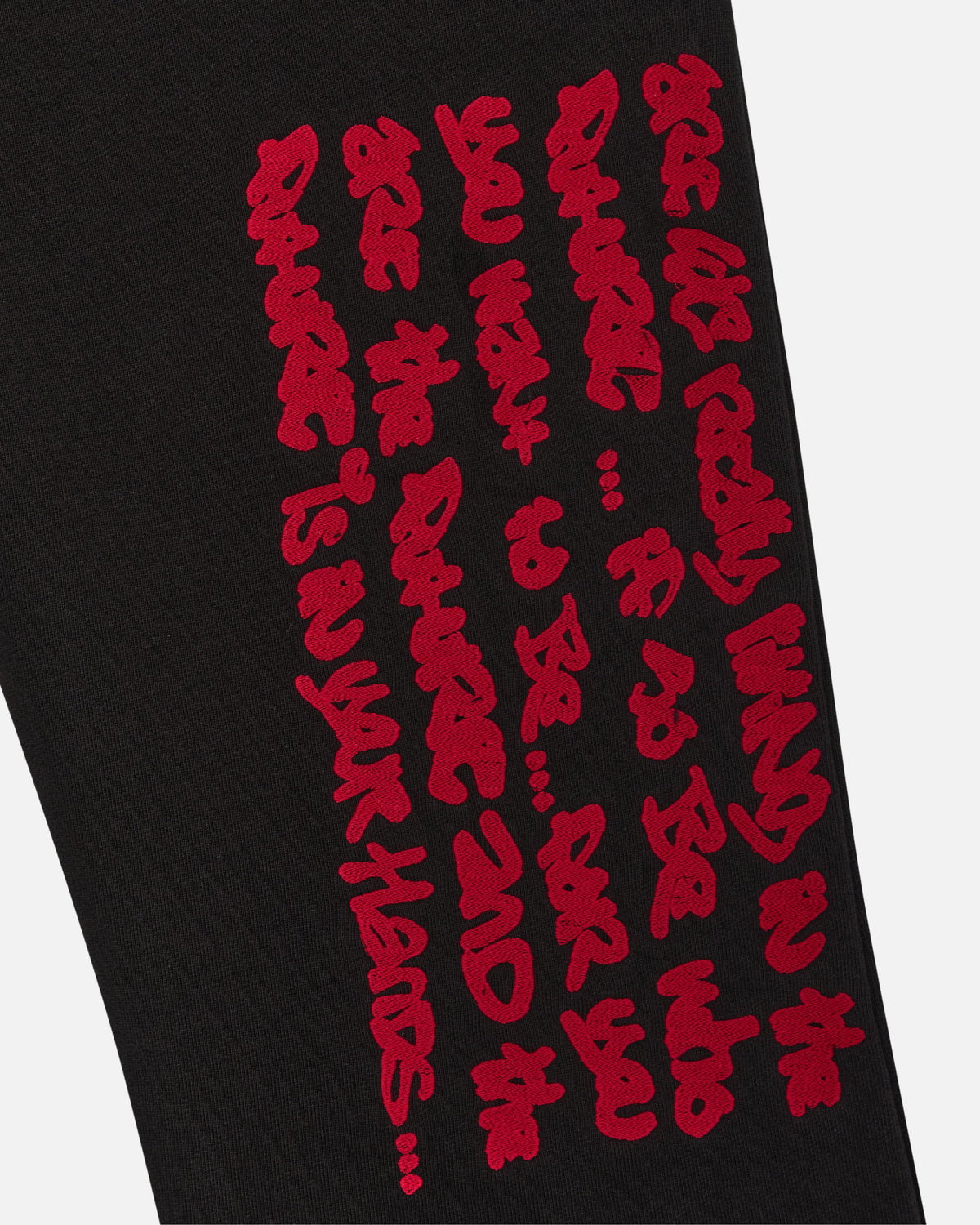 Walé Adeyemi Verse Jogger in Black/Red, embroidered graphic detail