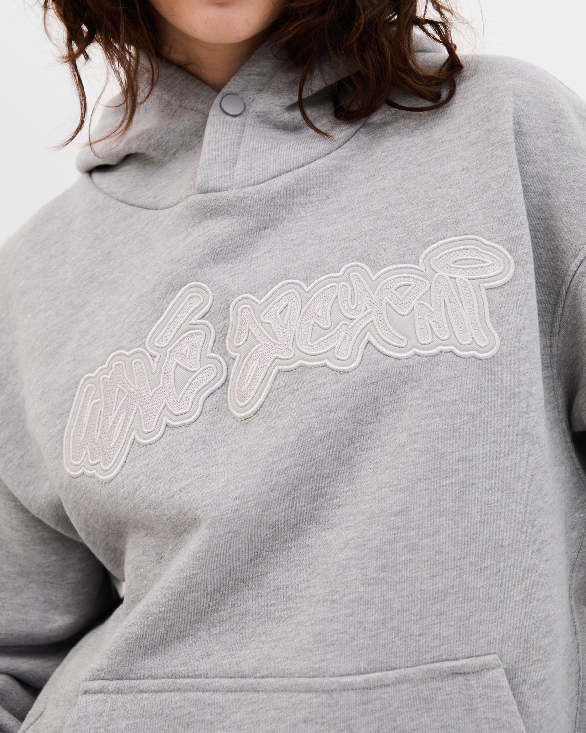 Walé Adeyemi grey hoodie with off-white script logo patch on the chest.