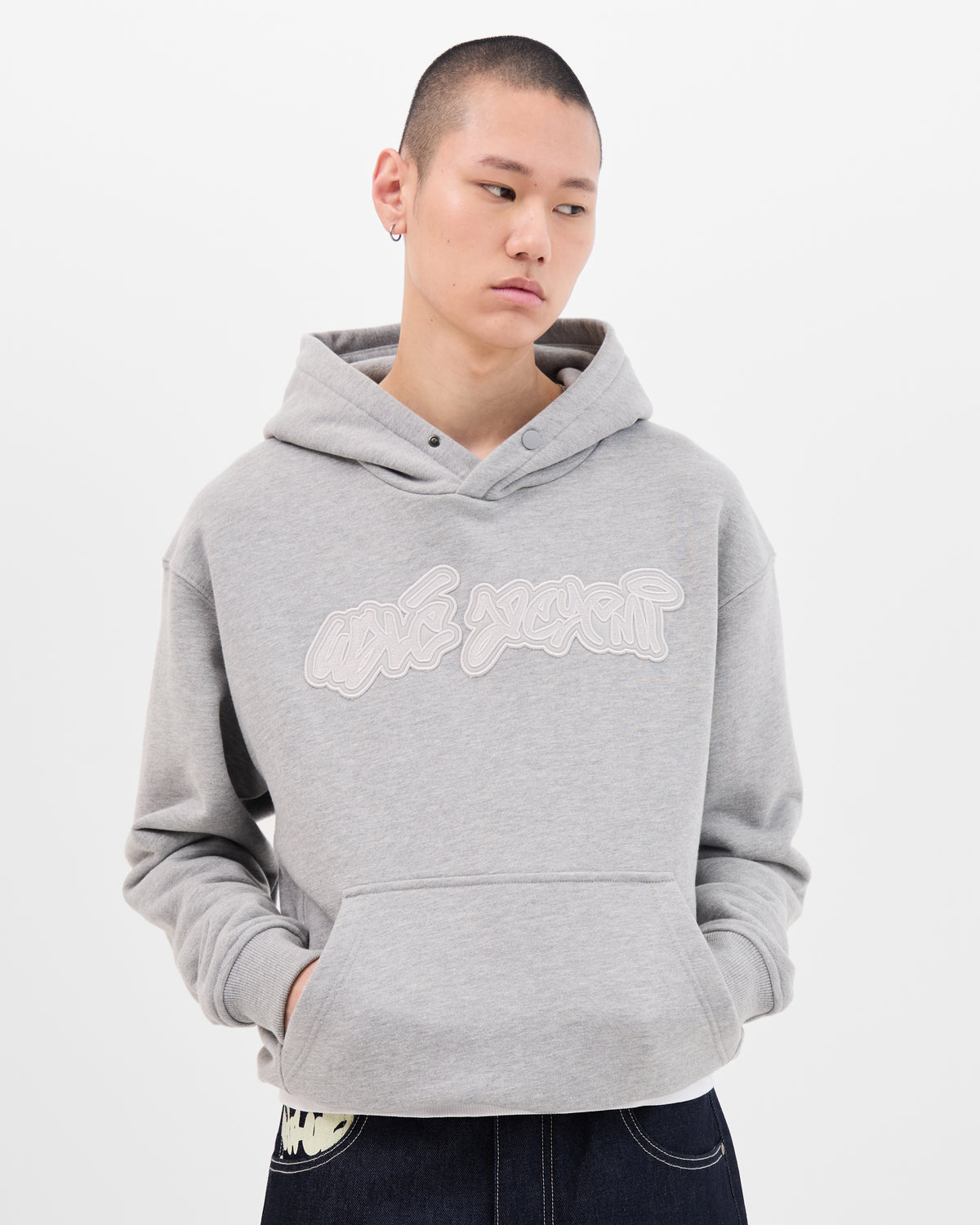 Walé Adeyemi grey hoodie with off-white script logo patch on the chest.