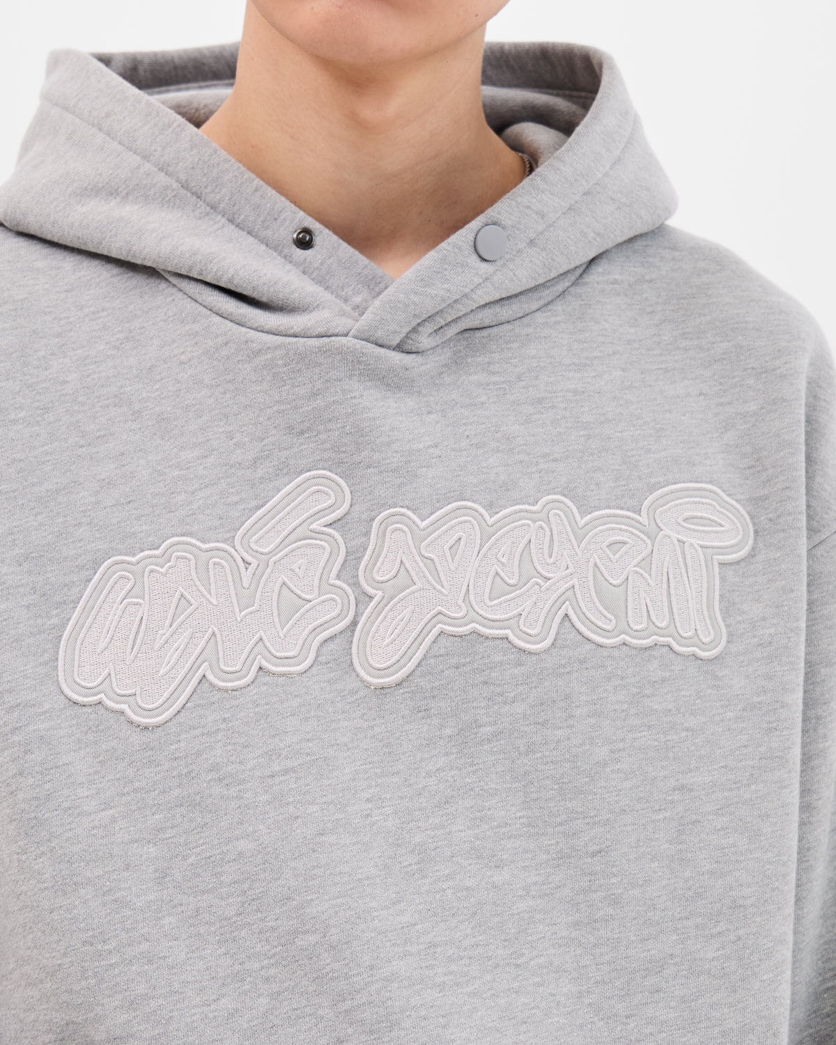 Walé Adeyemi grey hoodie with off-white script logo patch on the chest.
