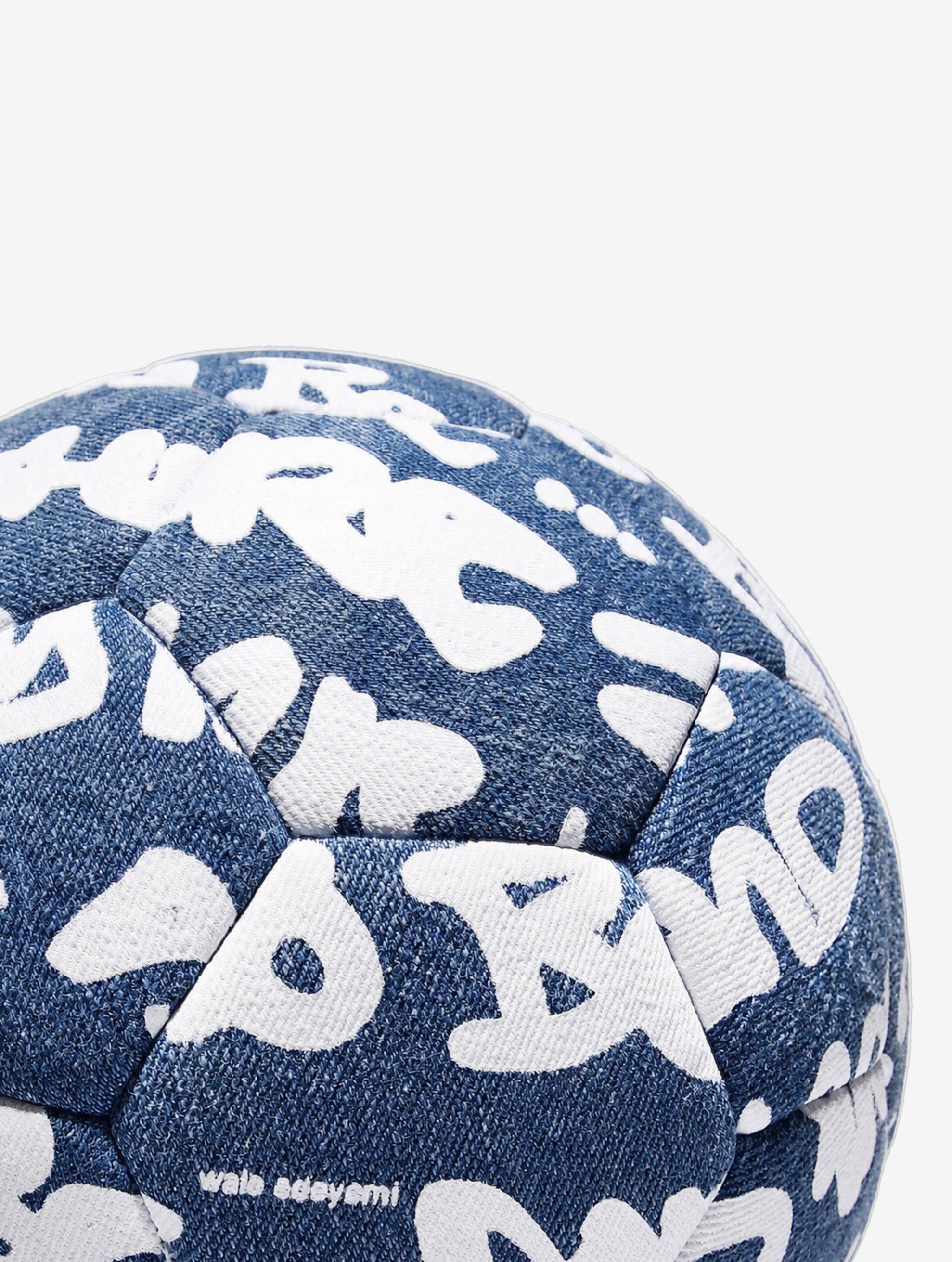 The Trivela denim graffiti football, close-up detail — By Walé Adeyemi