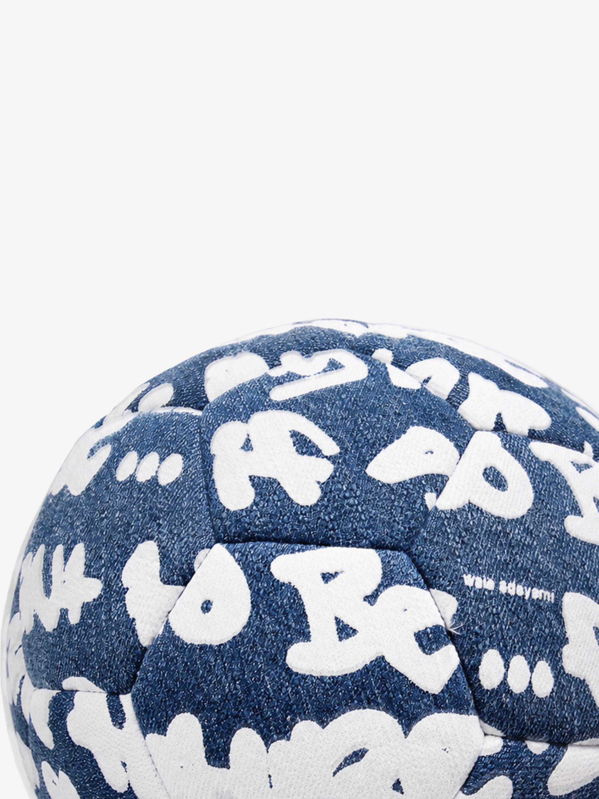 The Trivela denim graffiti football, styled shot — By Walé Adeyemi