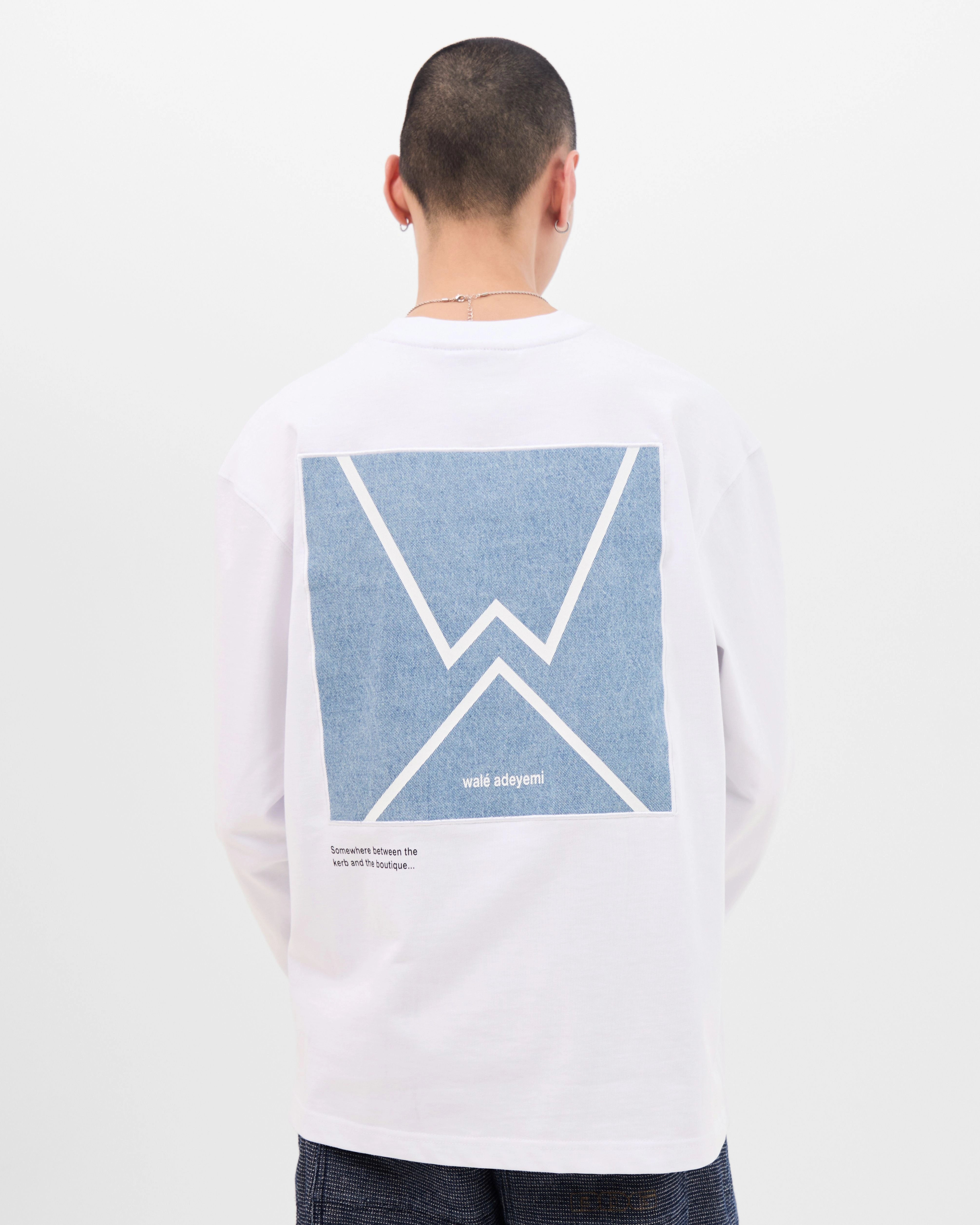 Model wearing the Walé Adeyemi Backbeat long-sleeve T-shirt in White/Blue, alternate back view