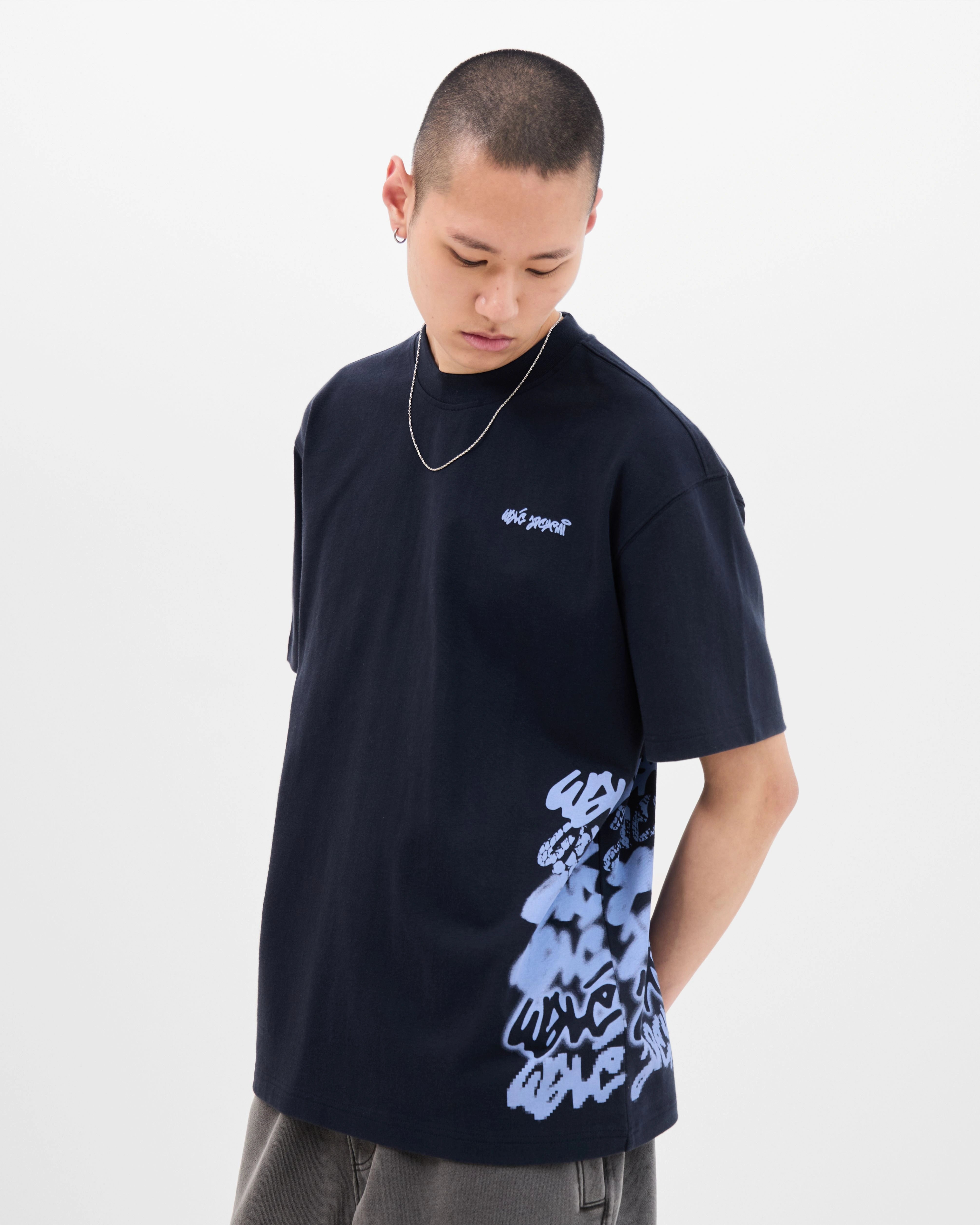 Model wearing the Walé Adeyemi Column T-shirt in Blue/Light Blue, front view