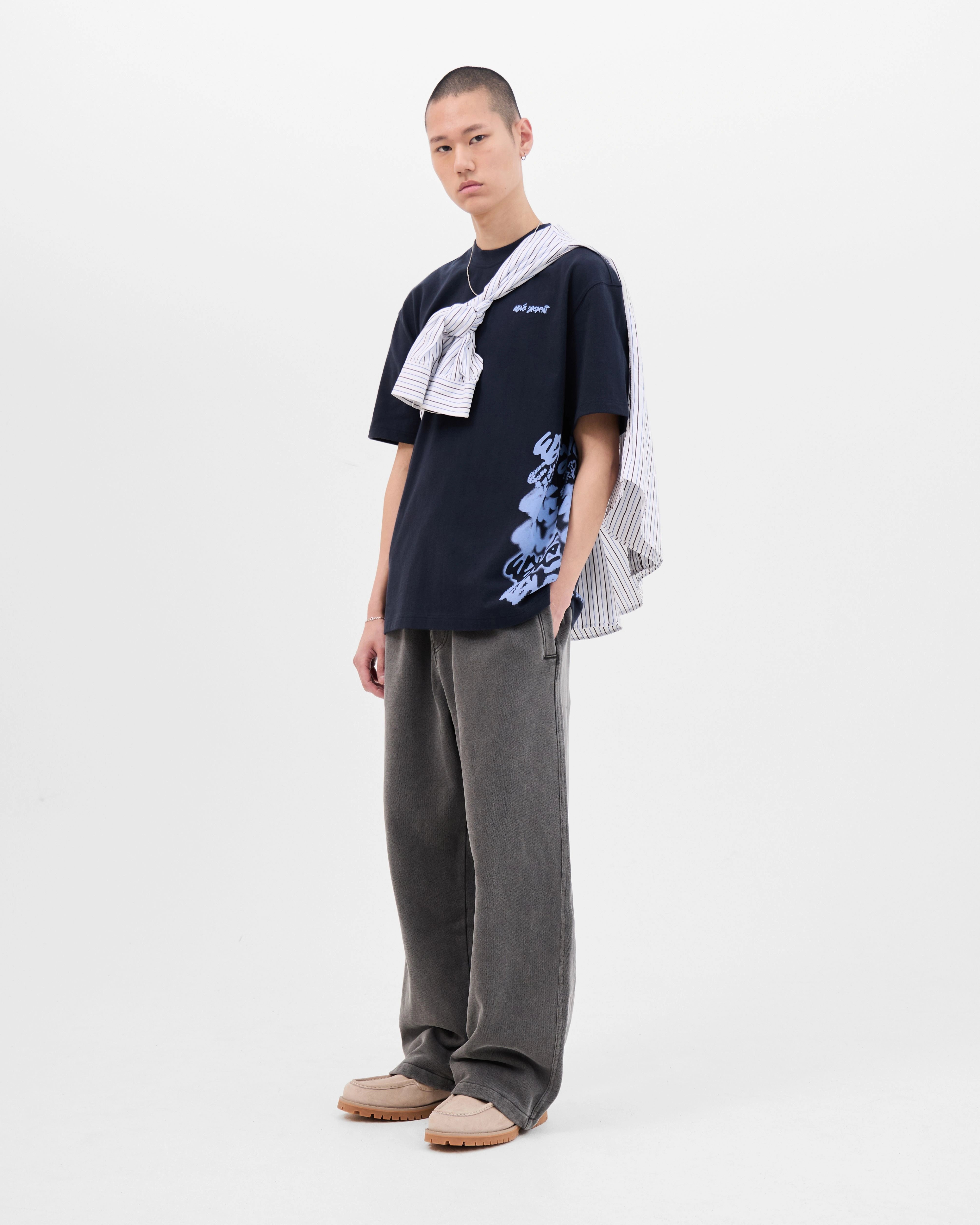 Model wearing the Walé Adeyemi Column T-shirt in Blue/Light Blue, full front view
