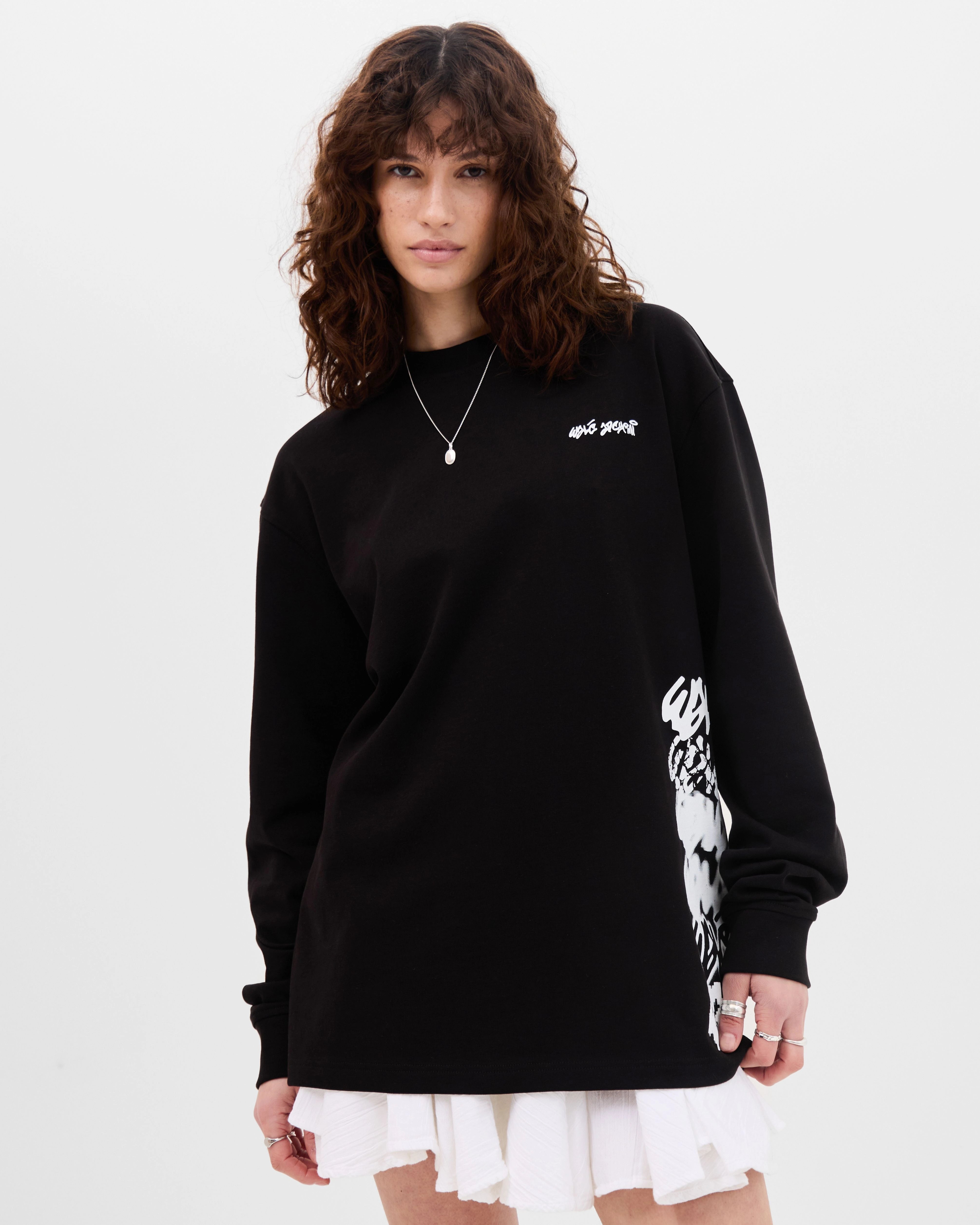 Model wearing the Walé Adeyemi Column long-sleeve T-shirt in Black/White, alternate front view