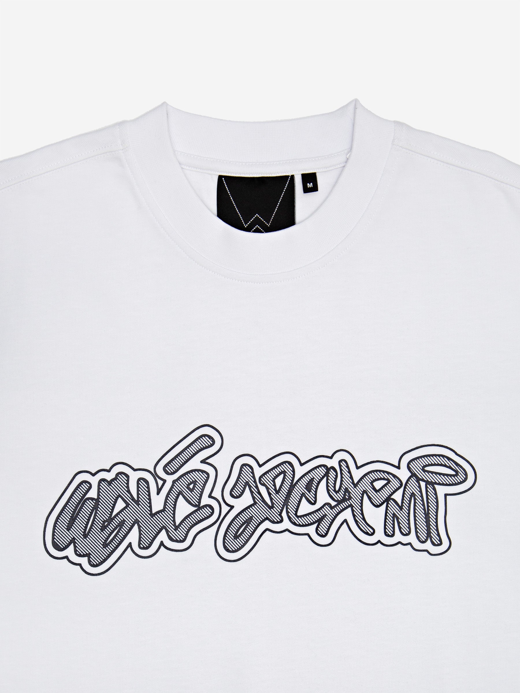 Close-up of the high-build graffiti chest print on the Walé Adeyemi Rhythm T-shirt in White/Black