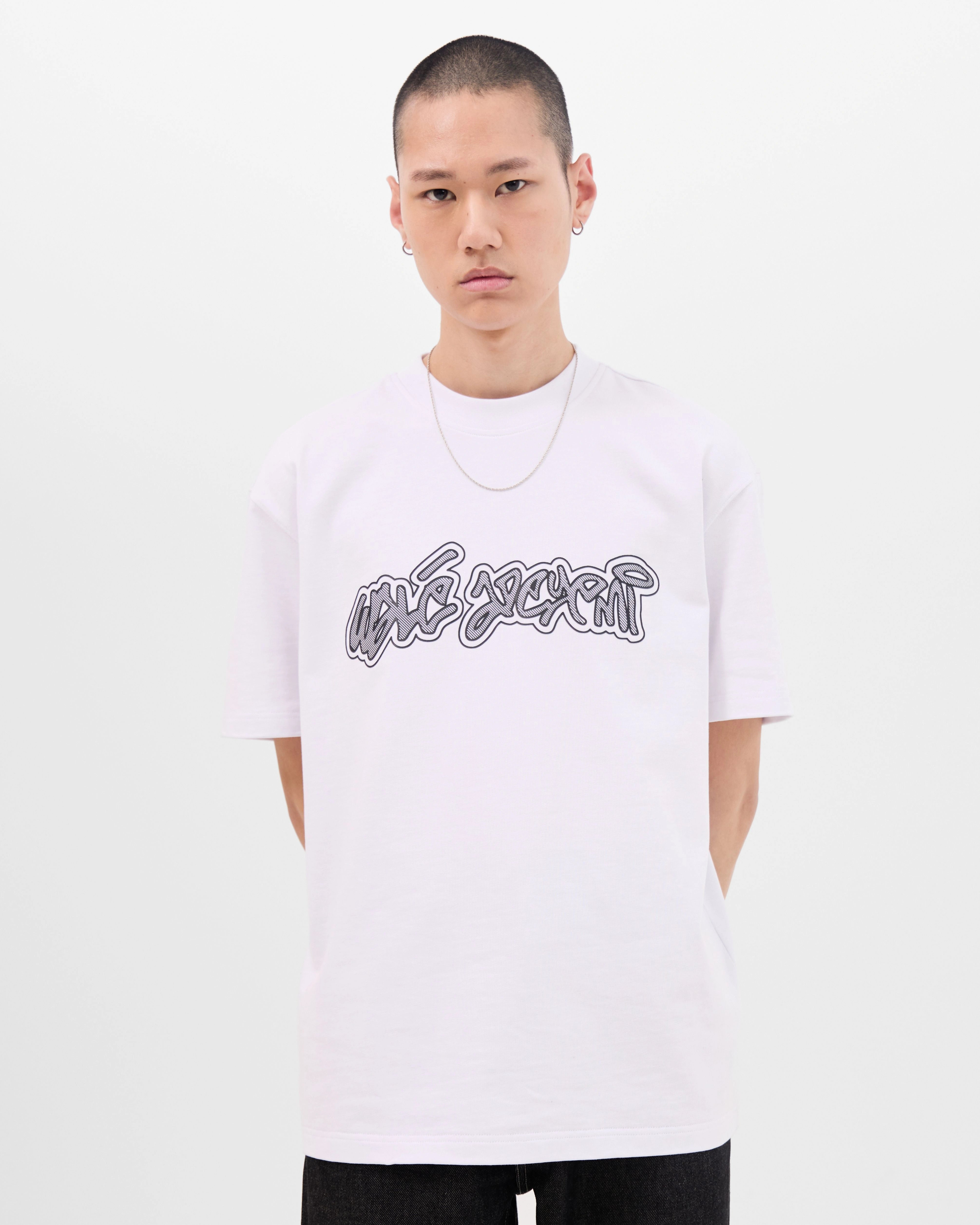 Model wearing the Walé Adeyemi Rhythm T-shirt in White/Black, front view