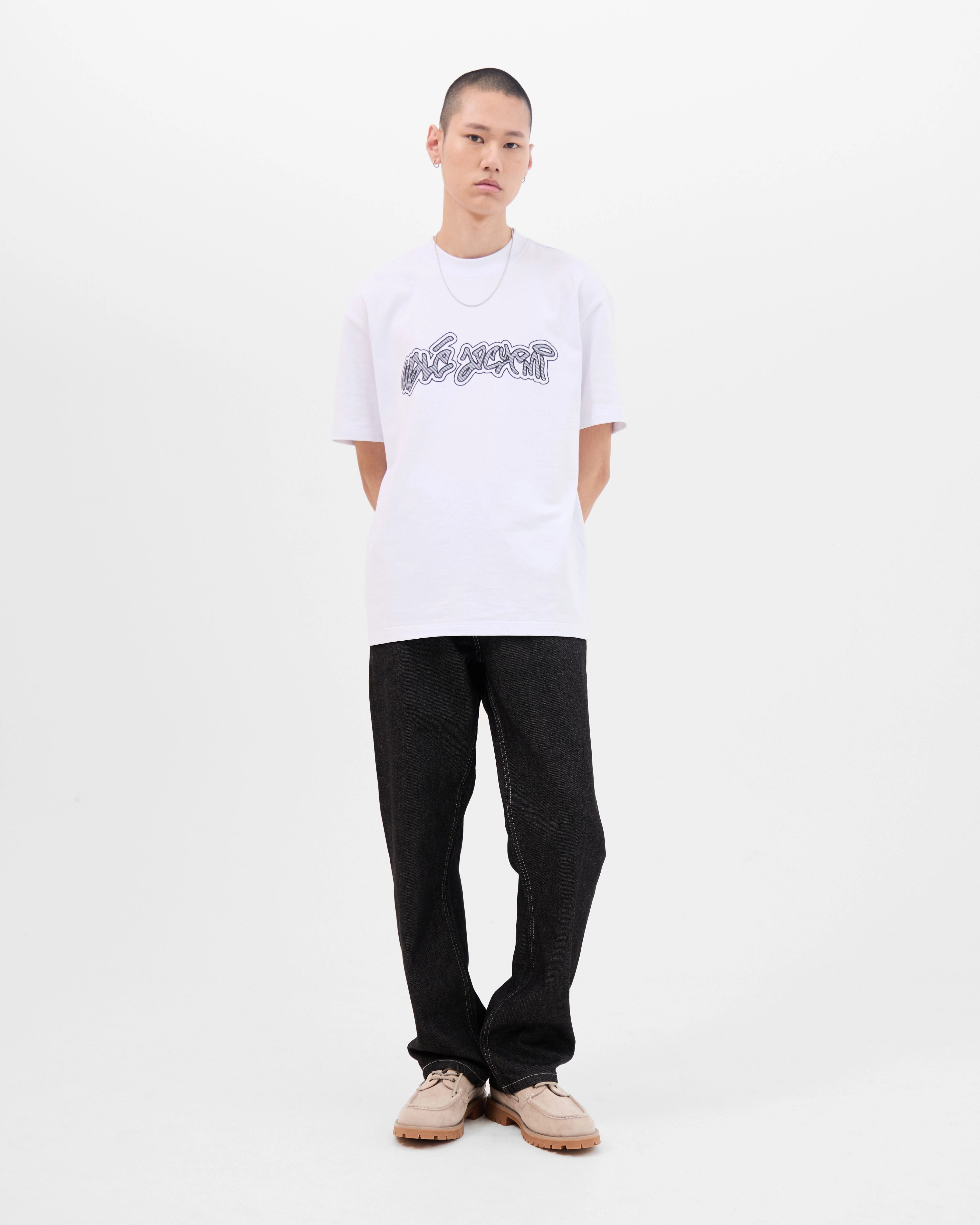 Model wearing the Walé Adeyemi Rhythm T-shirt in White/Black, full front view