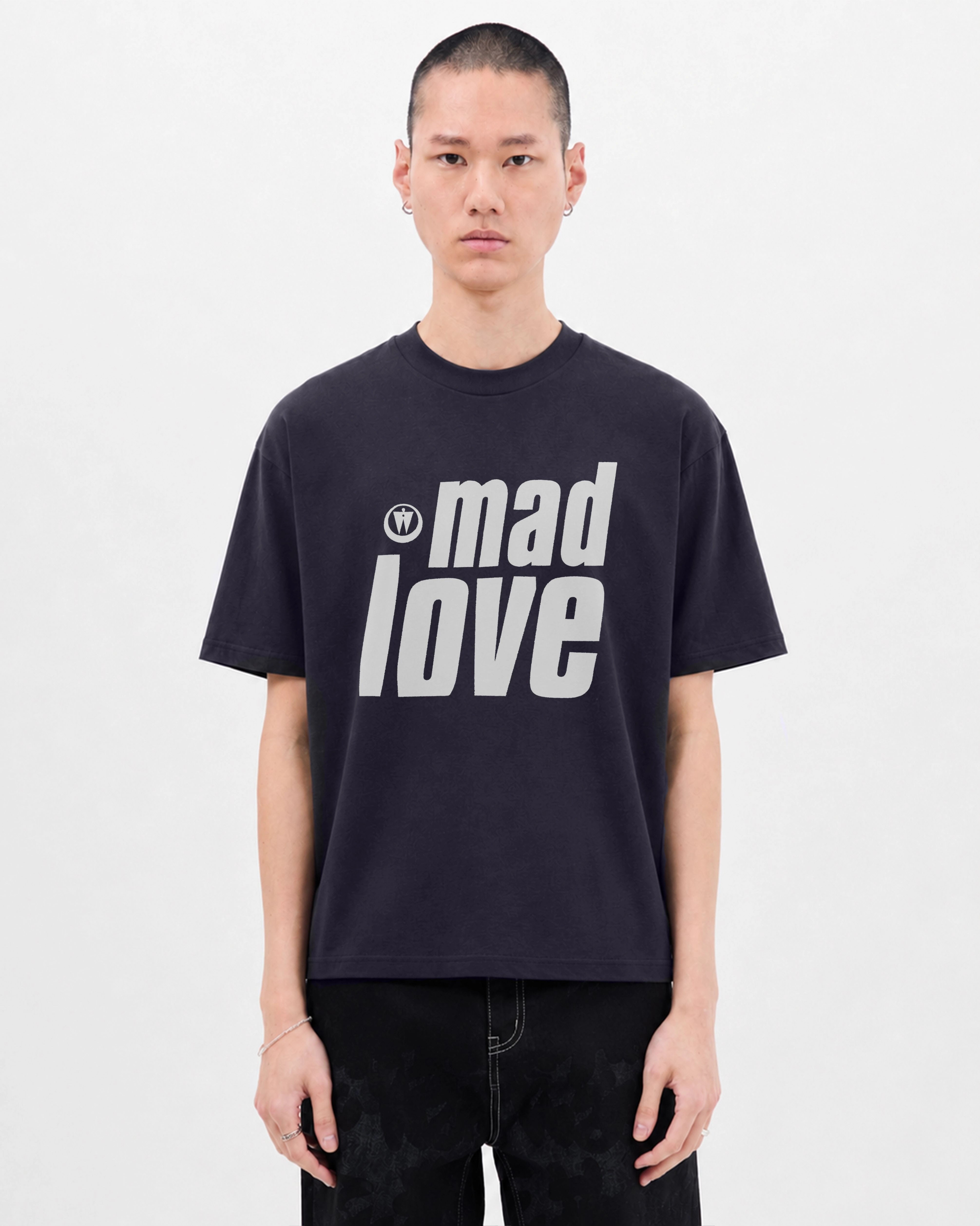 Model wearing the Walé Adeyemi Mad Love T-shirt in Navy/White