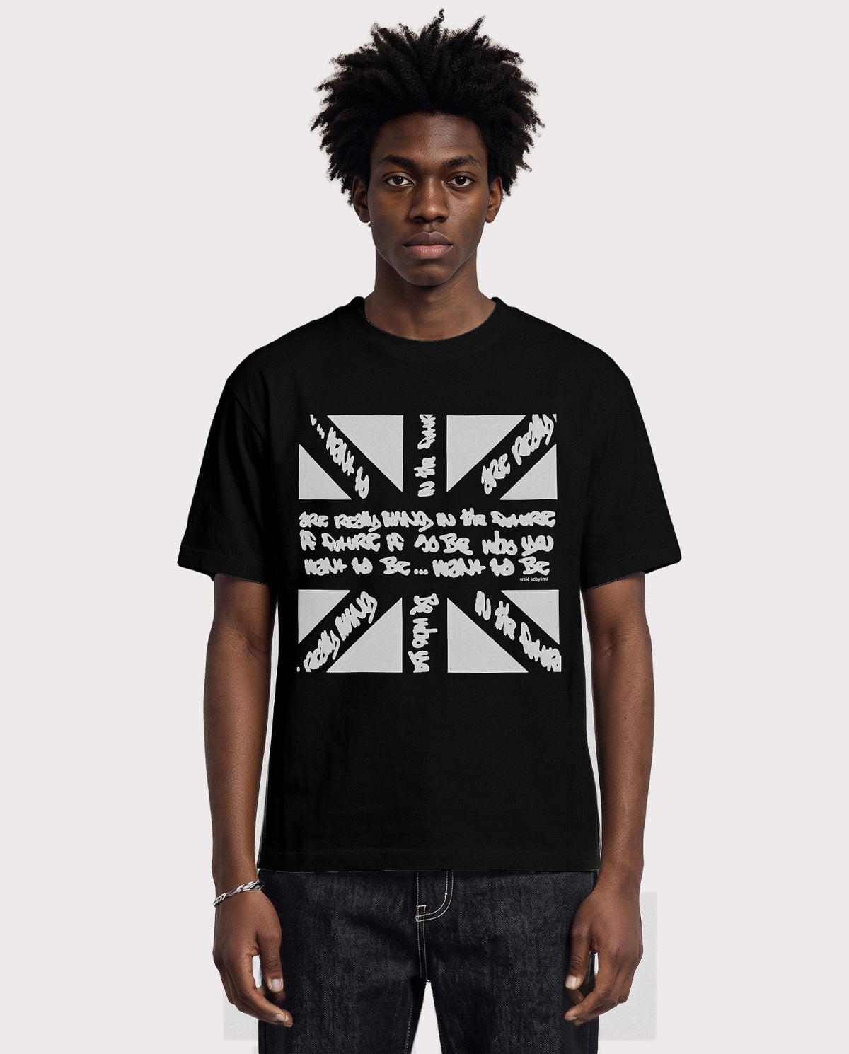 Model wearing the Walé Adeyemi Union T-shirt in Black/White, front view