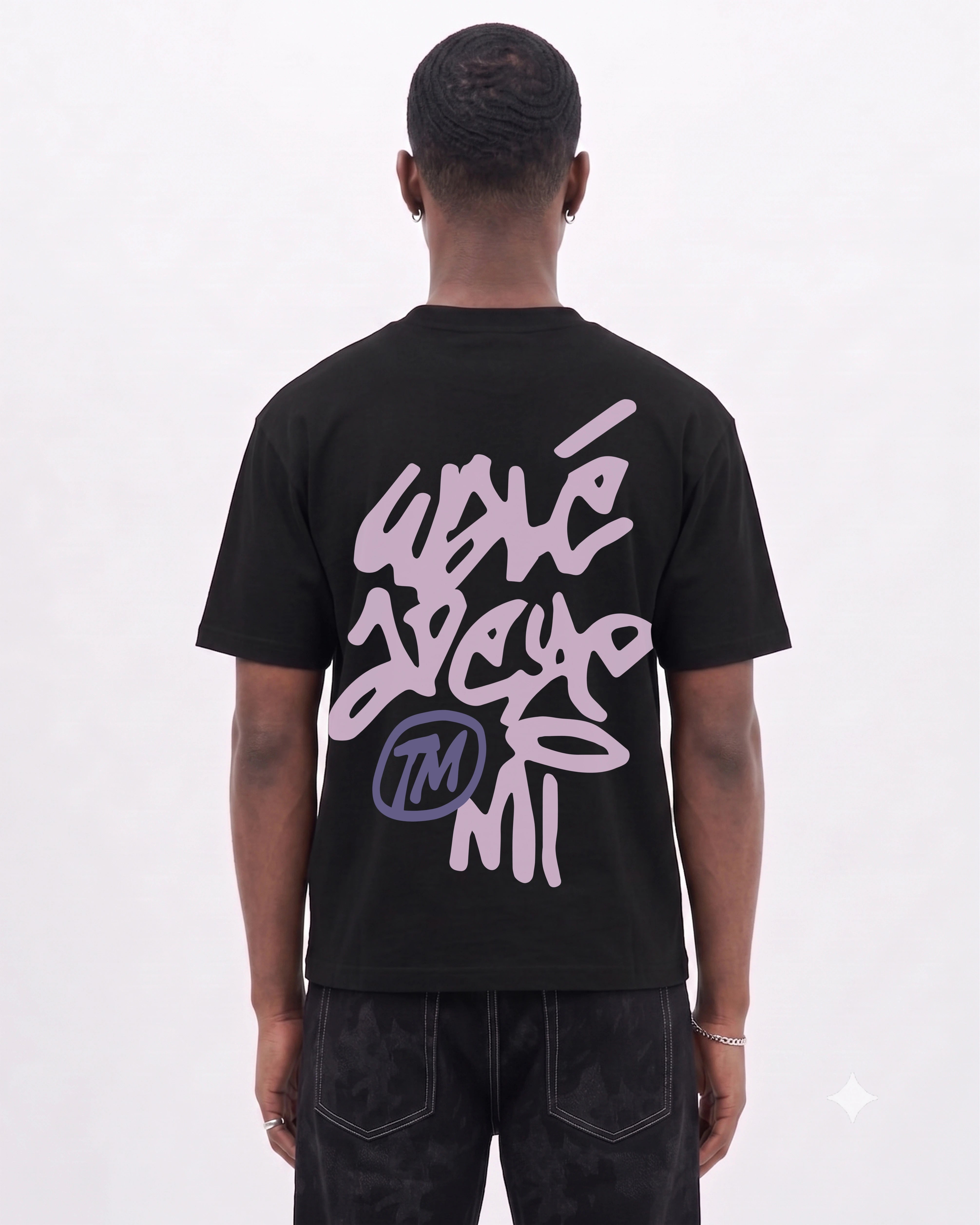 Model wearing the Walé Adeyemi Vinnie T-shirt in Black/Pink, back view