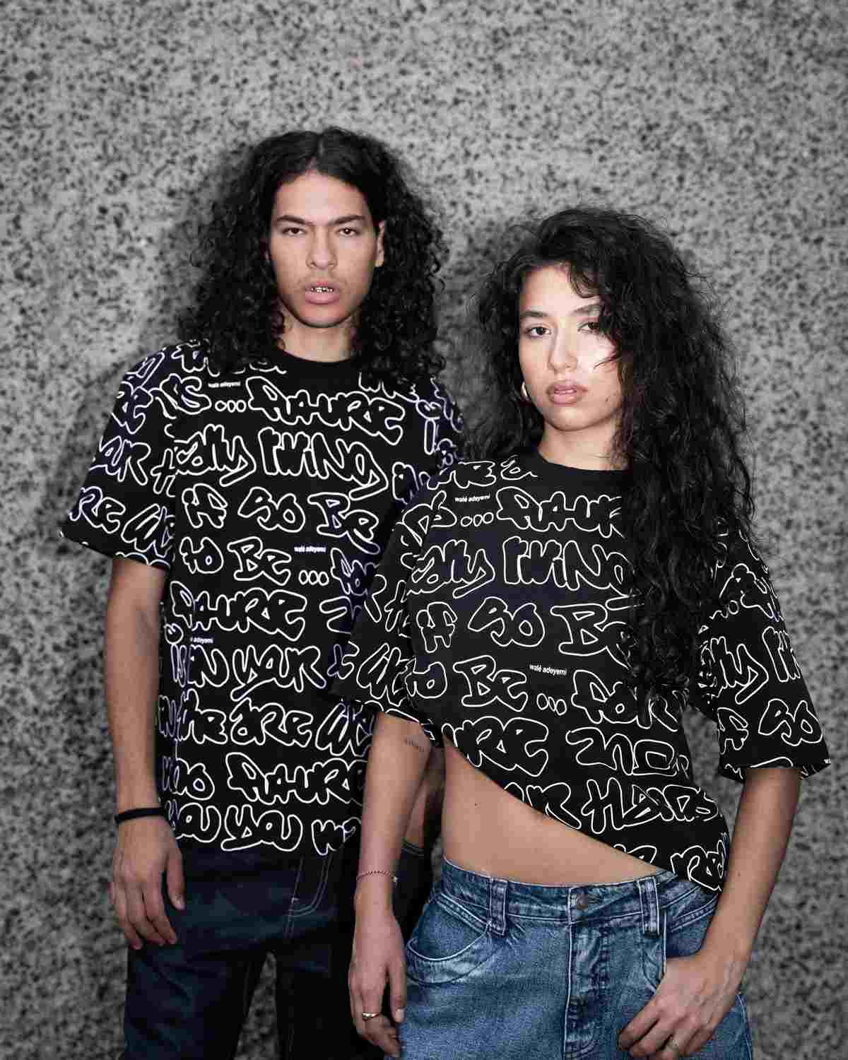 Man and women wearing wale adeyemi black grafti t shirt