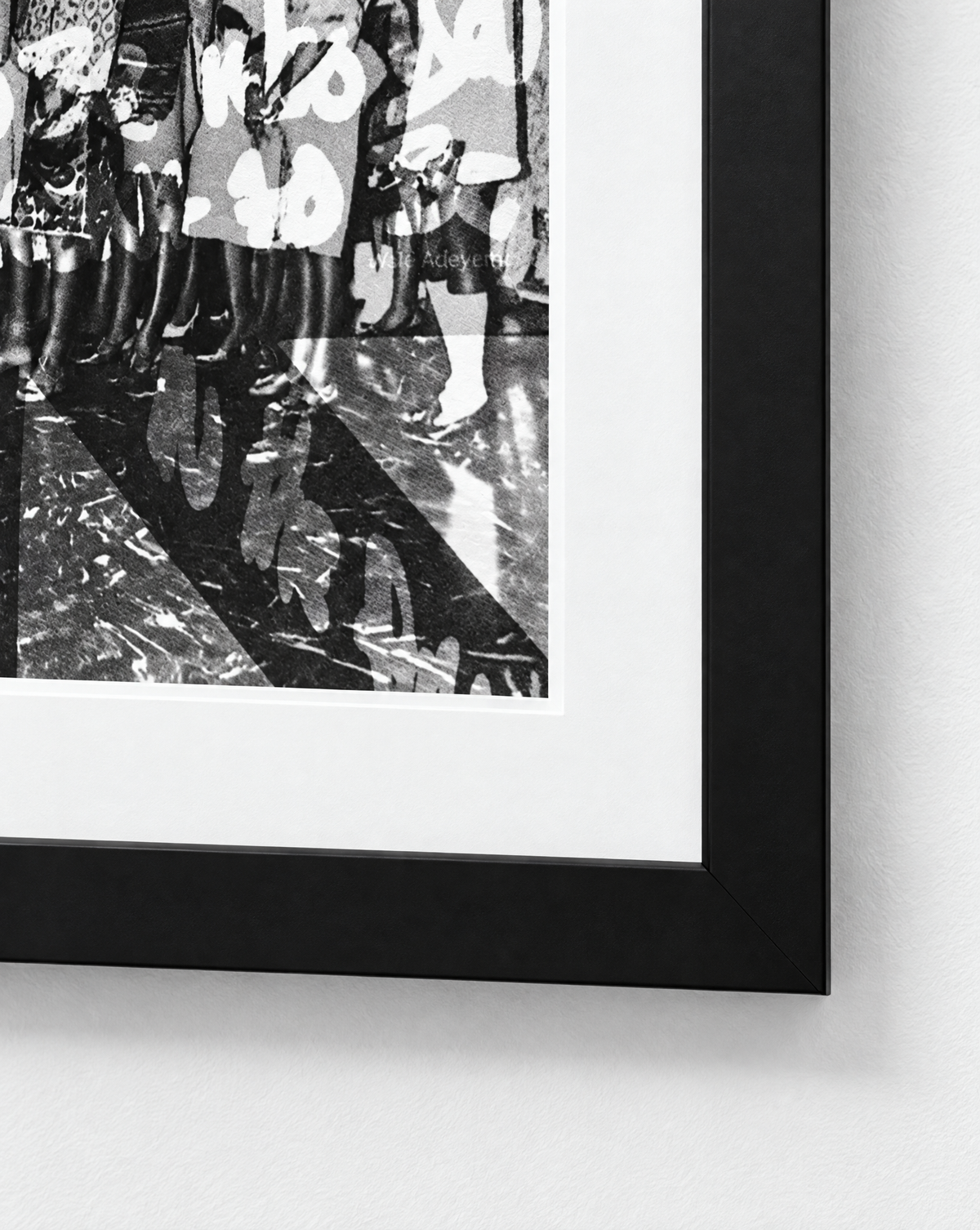 Close-up of Walé Adeyemi Diaspora Dance Floor showing the black-and-white artwork, white mount and lower-right black frame corner.