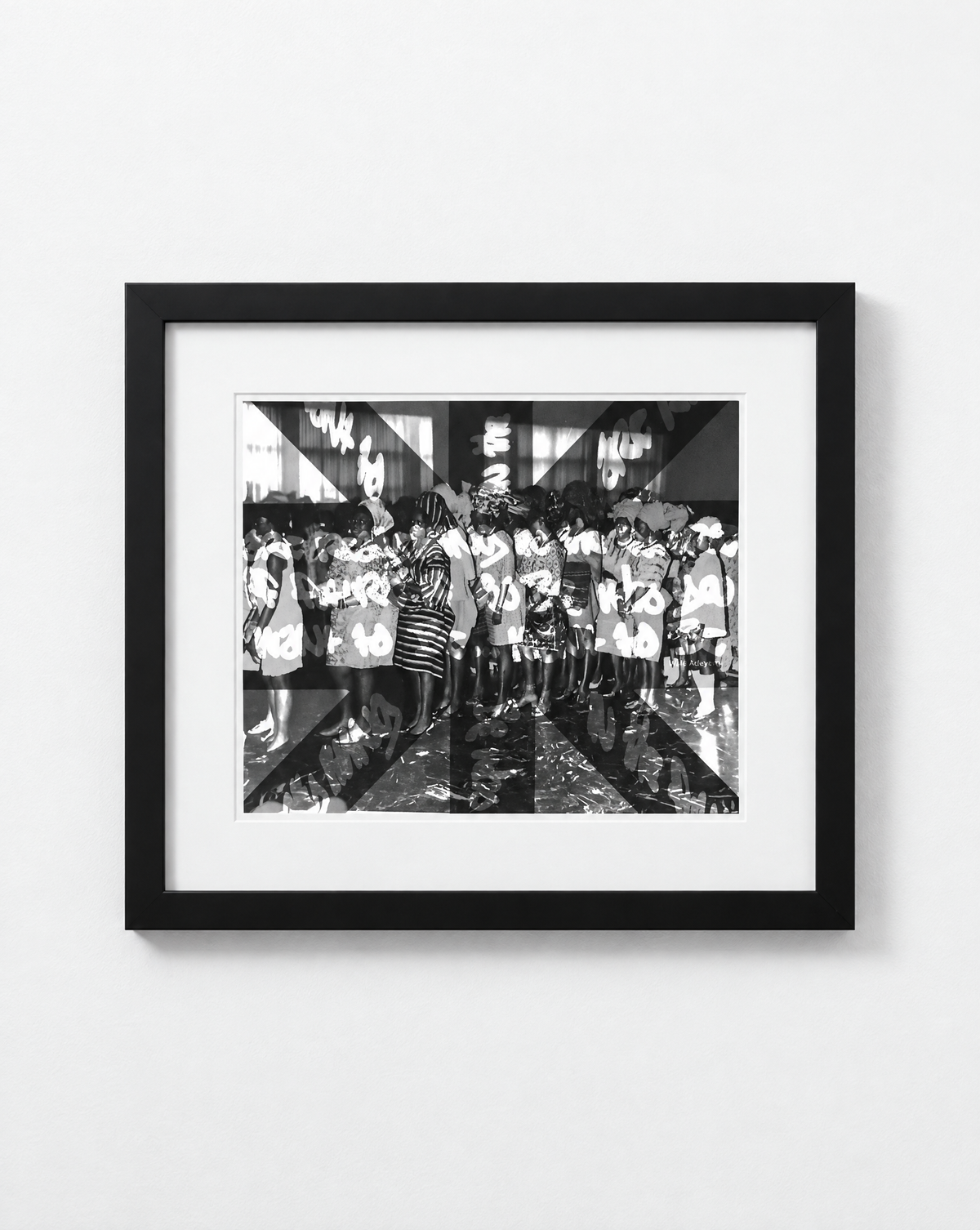 Walé Adeyemi Diaspora Dance Floor black-and-white art print in a black frame with a white mount, displayed on a white wall.